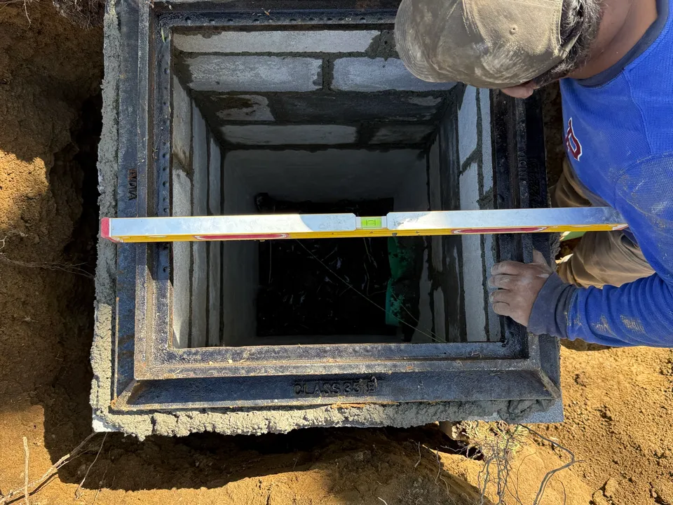 Leveling a catch basin frame before the grate goes on