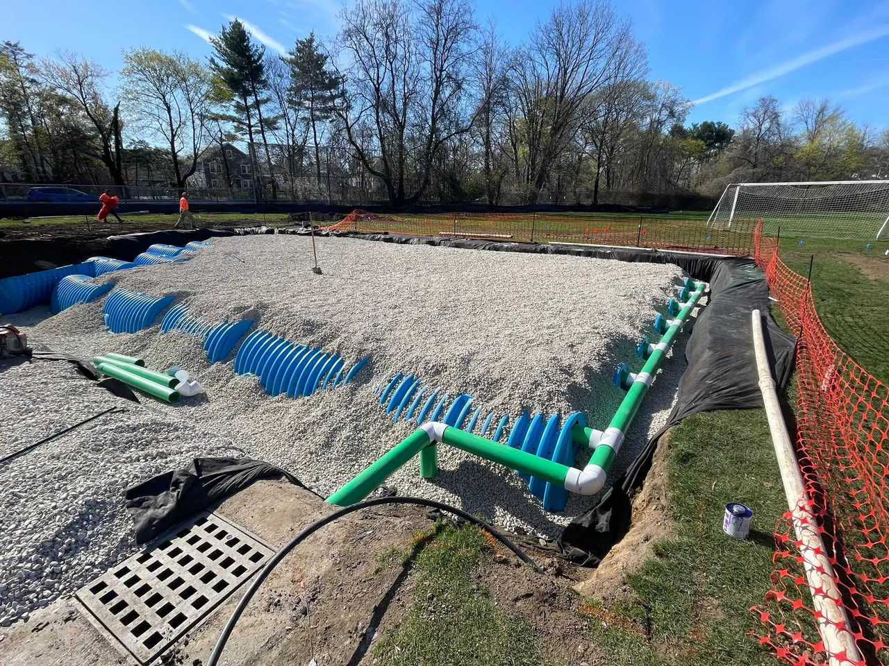 Stormwater chambers bedded in clean stone with the feed pipes connected